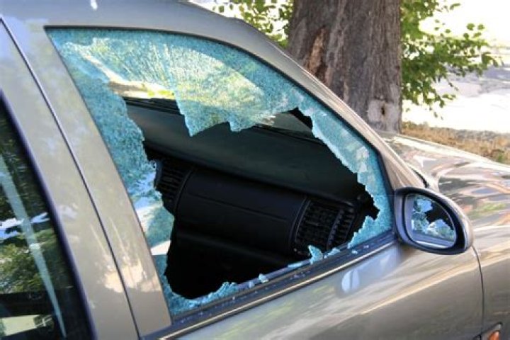 How do you cover a broken car window in the rain