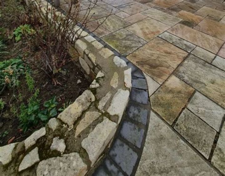 How do you get green algae off bricks