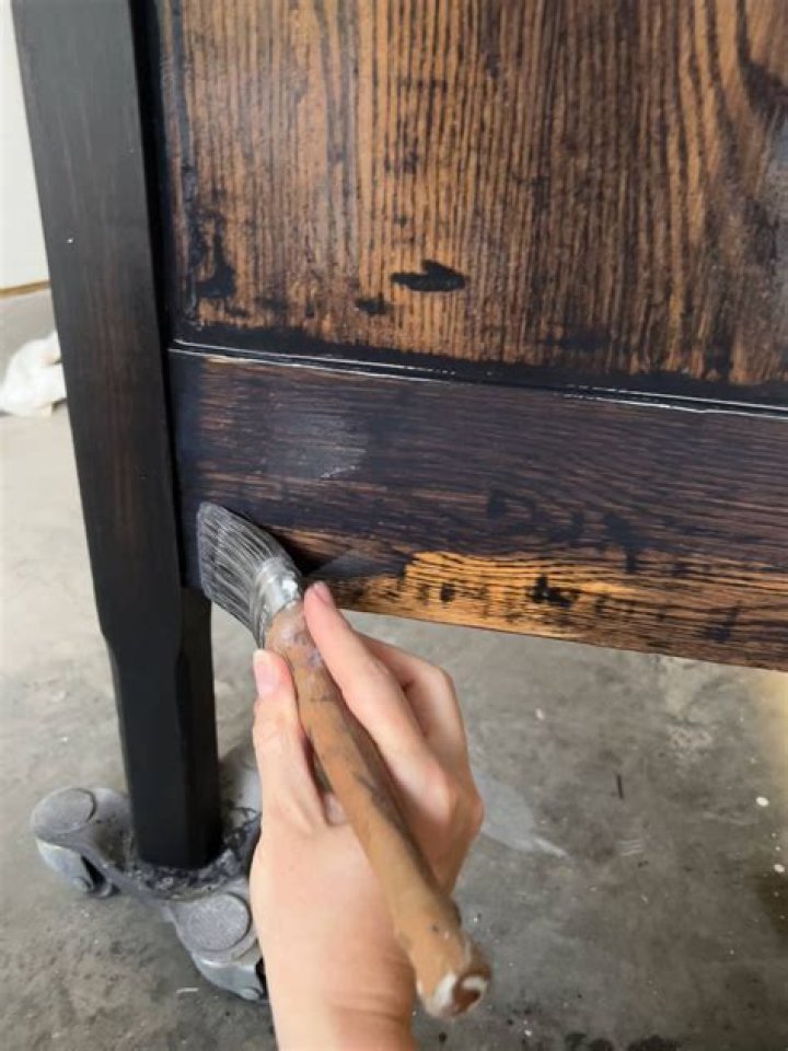 How do you paint stained wood furniture