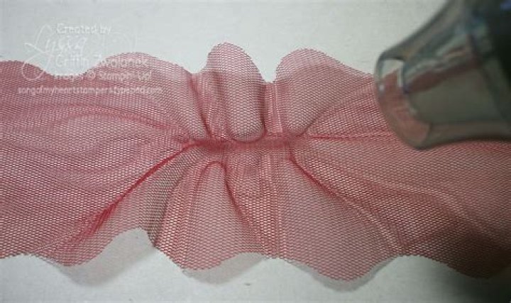 How do you wrap a tulle around a railing