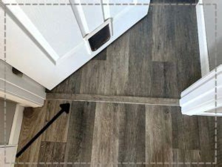 Where do you put the transition strip in doorway
